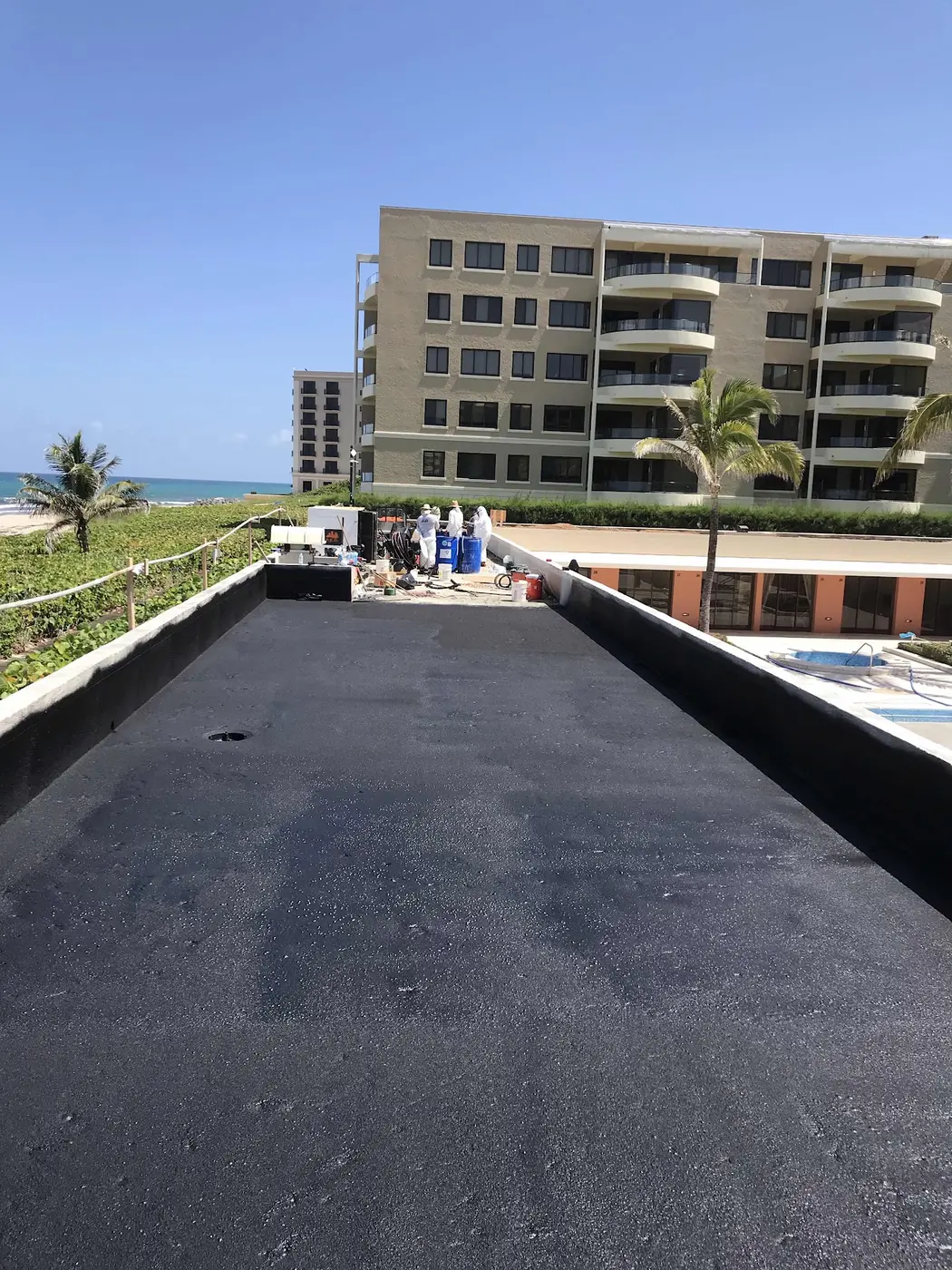 Long low-slope roof waterproofed edge to edge with Wetsuit liquid membrane